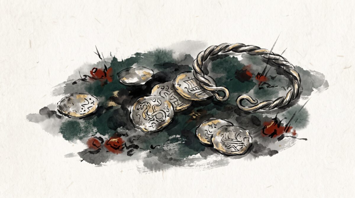Tarnished Viking-age silver coins and a bracelet lying on dark earth